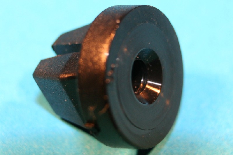 Nylon snap-in nut for 6.9mm square hole and used with No.6 self-tapping screw. Panel thickness 0.8-2.4mm.  Ford, Jaguar and general application.