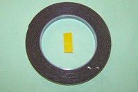 Double-Sided Adhesive Foam Tape - Yellow Backing.  Designed for automotive trim fixing.  Delayed cure allows for repositioning where required. 12mm x 5m